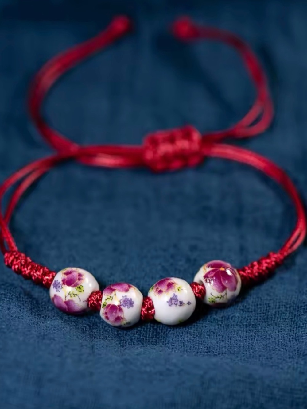 Red Cord Bracelet with Floral Ceramic Beads